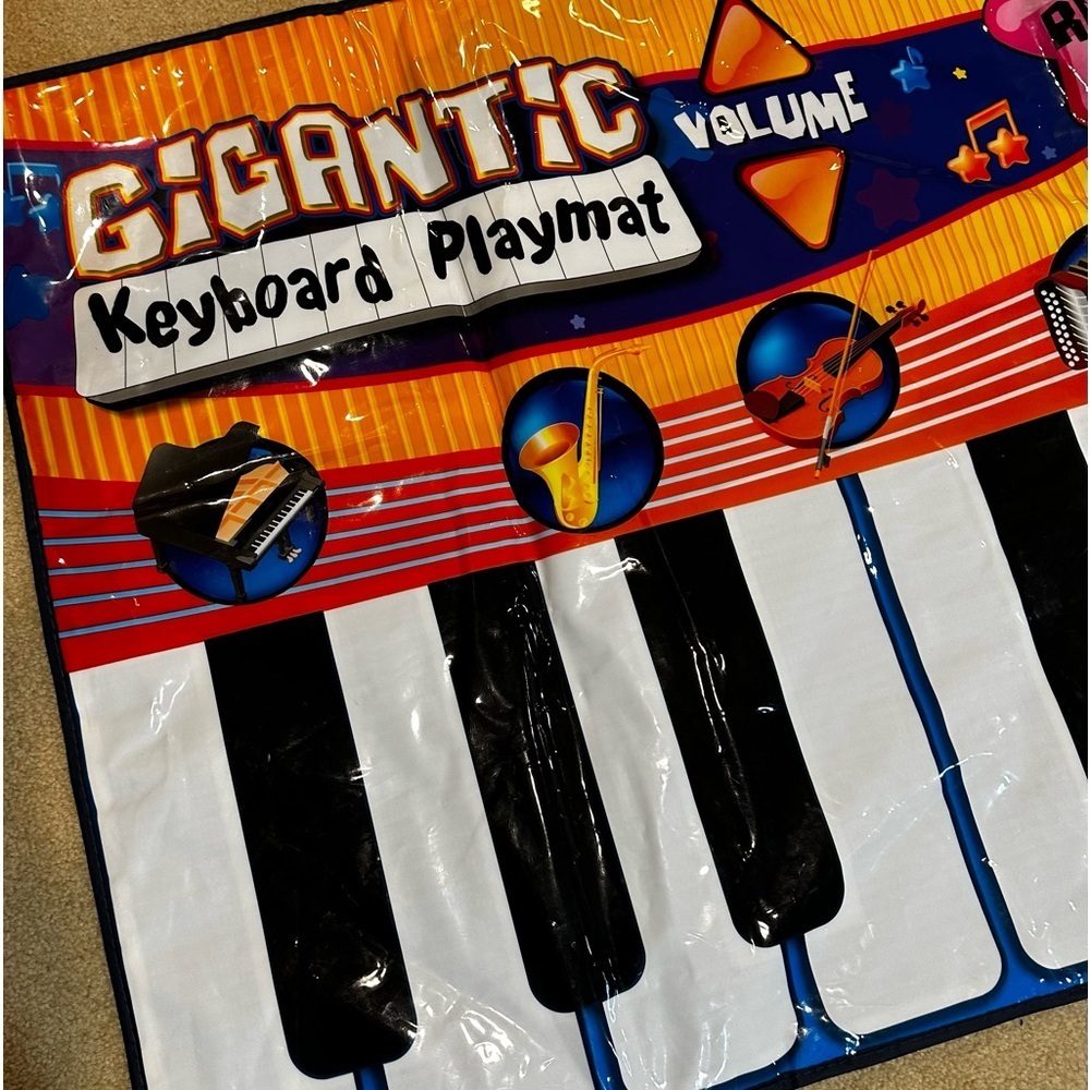 Gigantic keyboard playmat - musical